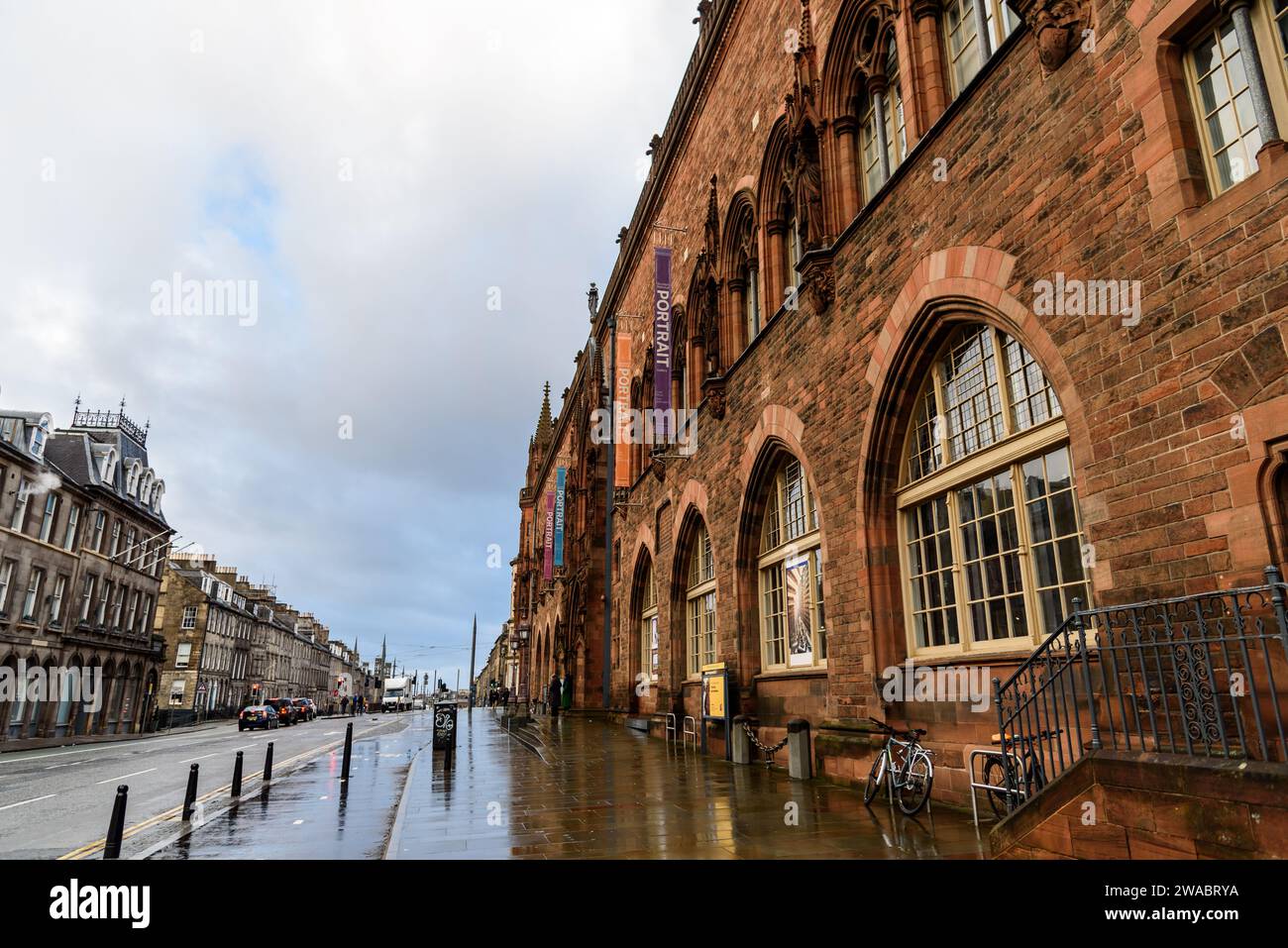 Edinburgh, UK - December 5, 2023: St David Street in the New Town with Scott Monument on background a rainy day Stock Photo