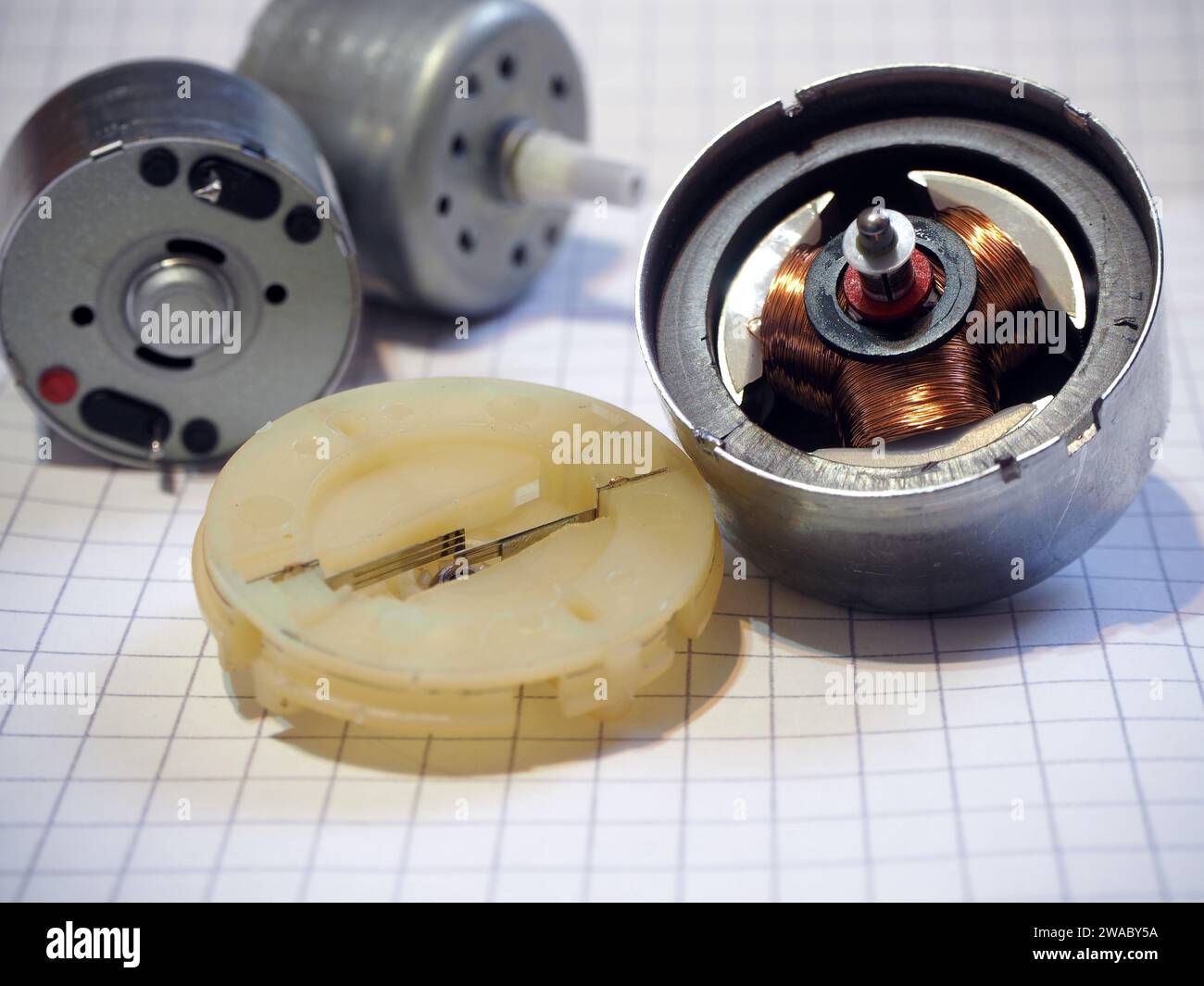 Coils and rotor inside of the motor. Opened DC electric motor Stock