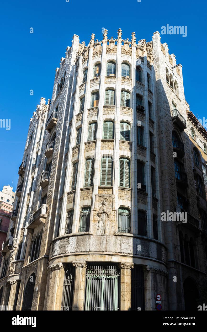 Barcelona, Spain - November 19, 2023: Facade of a classic building in Via Laietana, Barcelona, Catalonia, Spain Stock Photo