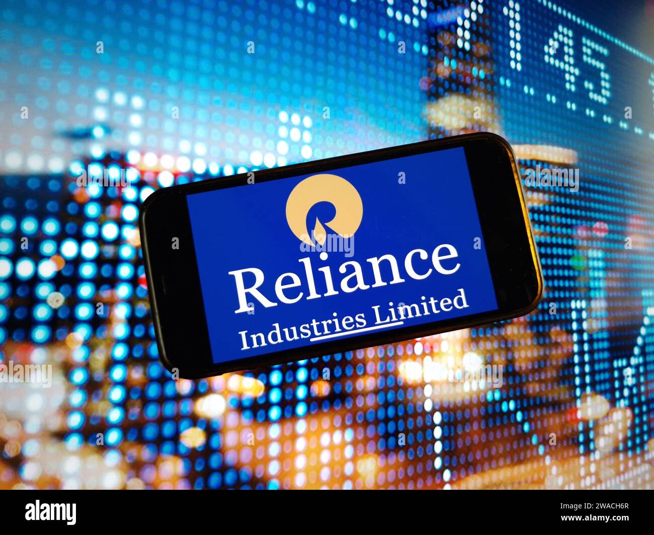 Konskie, Poland - January 03, 2024: Reliance Industries Limited company logo displayed on mobile phone screen Stock Photo