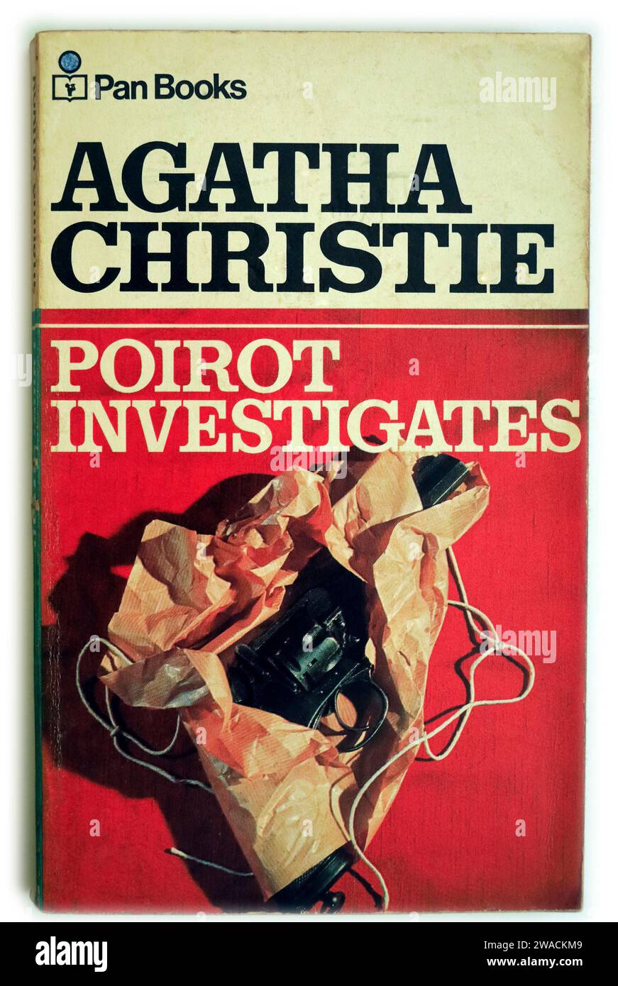 Poirot Investigates. An Agatha Christie paperback on white background