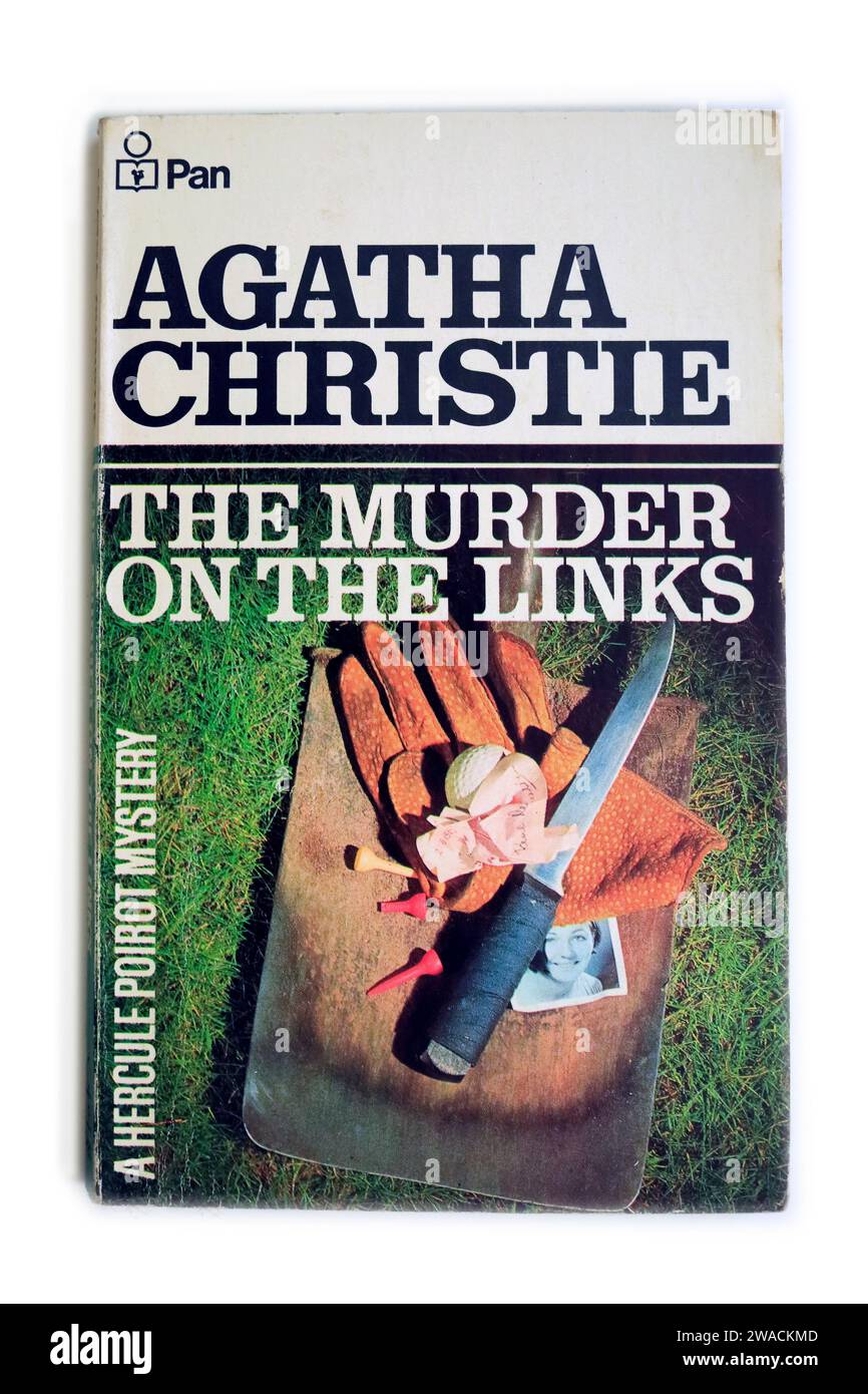 The Murder ON The Links. An Agatha Christie paperback on white