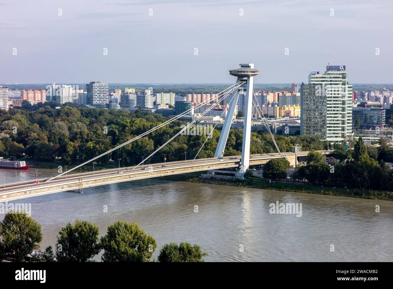 BRATISLAVA, SLOVAKIA - SEPTEMBER 6, 2014: Famous New Bridge (Novy most) across the Danube River in Bratislava, Slovakia. Stock Photo