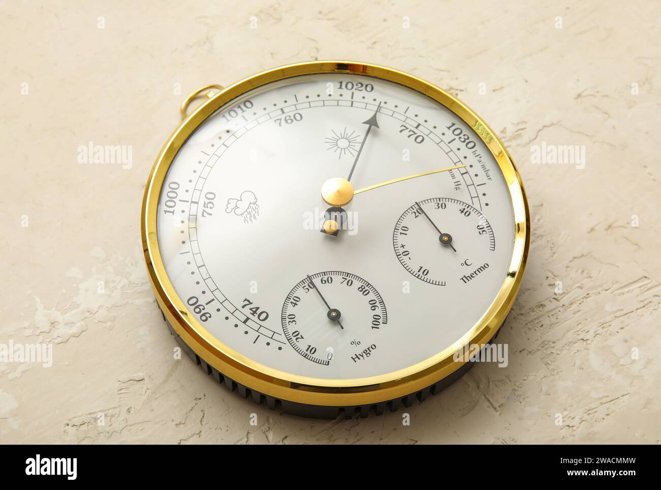 Aneroid barometer on grey grunge background Stock Photo