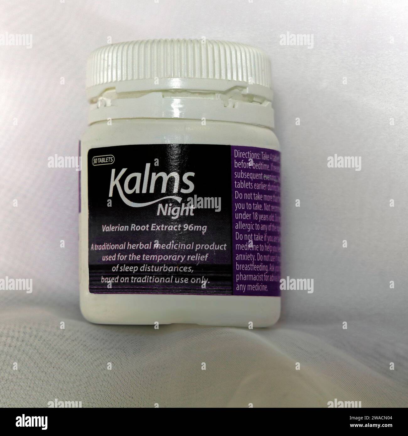 Kalms Night - Valerian root extract tablets plastic container. Studio set up. December 2023. Stock Photo