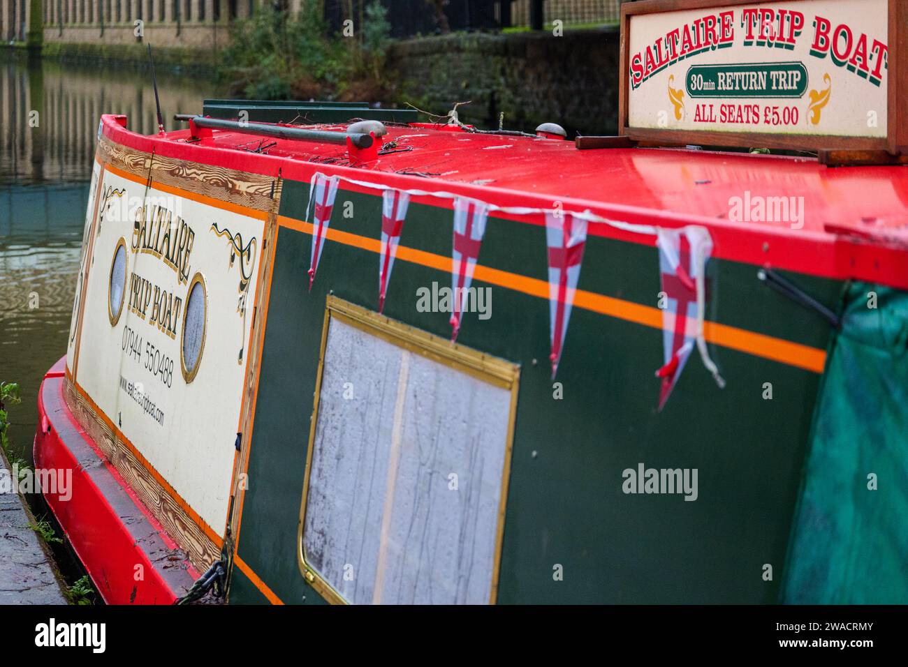 Narrowboat Titus a Saltaire Trip Boat on the Leeds Liverpool Canal Stock Photo