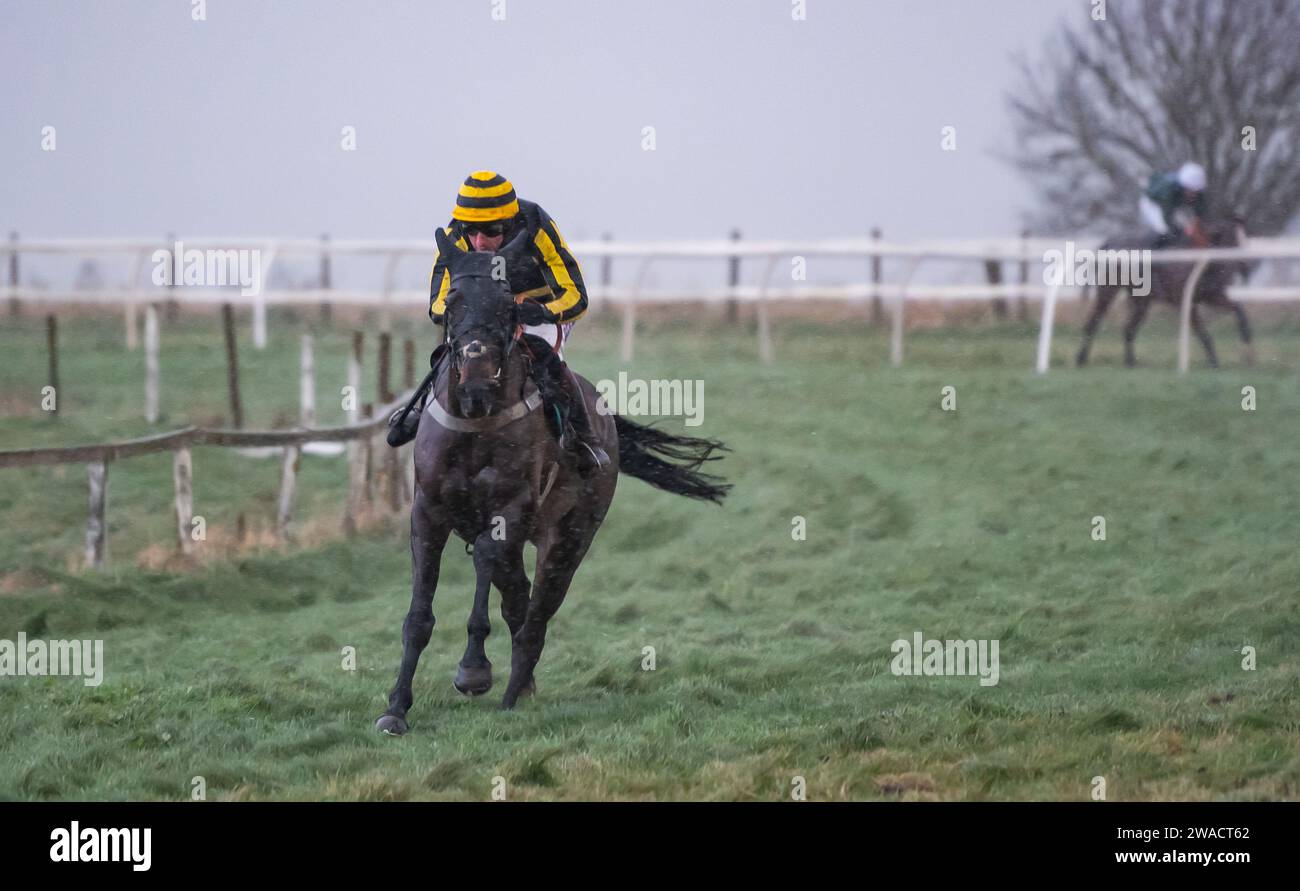 Wolf Walker and jockey Will Biddick win at Larkhill Racecourse, Wiltshire, UK, New Years' Eve 2023 for trainer Christopher Barber. Stock Photo