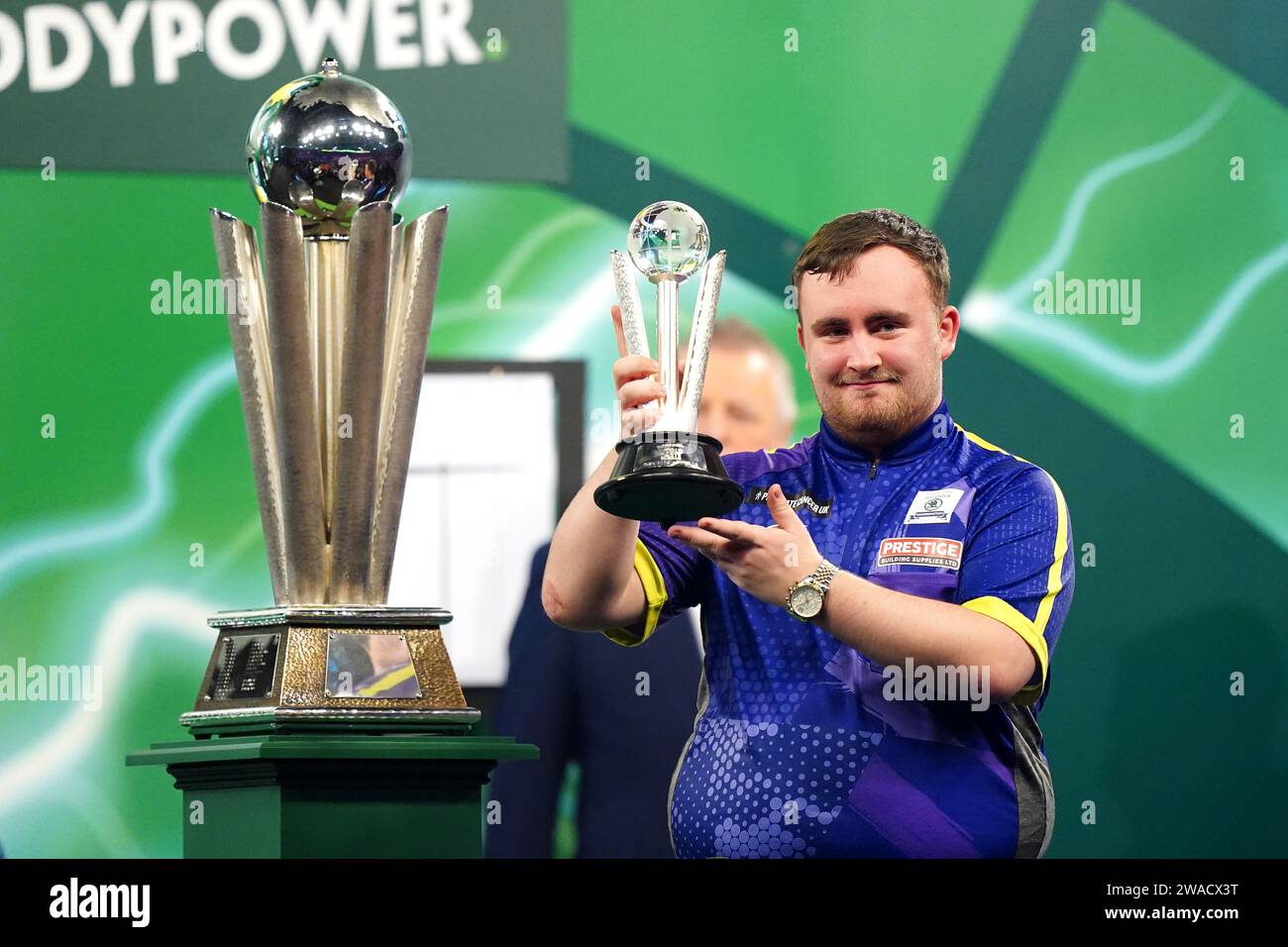 Luke Littler reacts losing to Luke Humphries (left) in the final of the