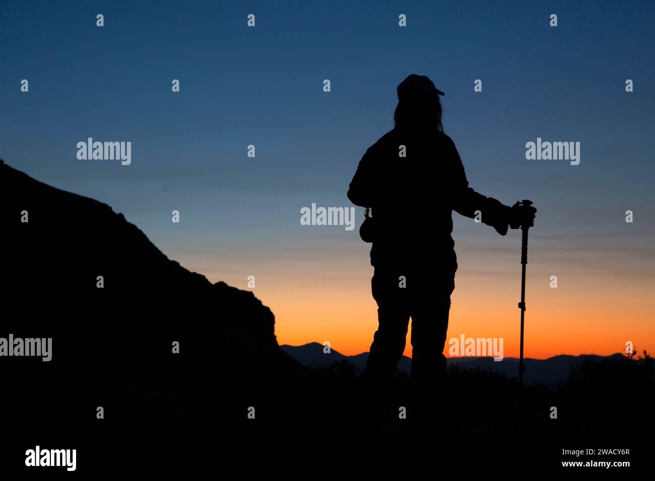 Hiker at dawn, Calico Mountains Wilderness, Black Rock Desert High Rock Canyon Emigrant Trails National Conservation Area, Nevada Stock Photo