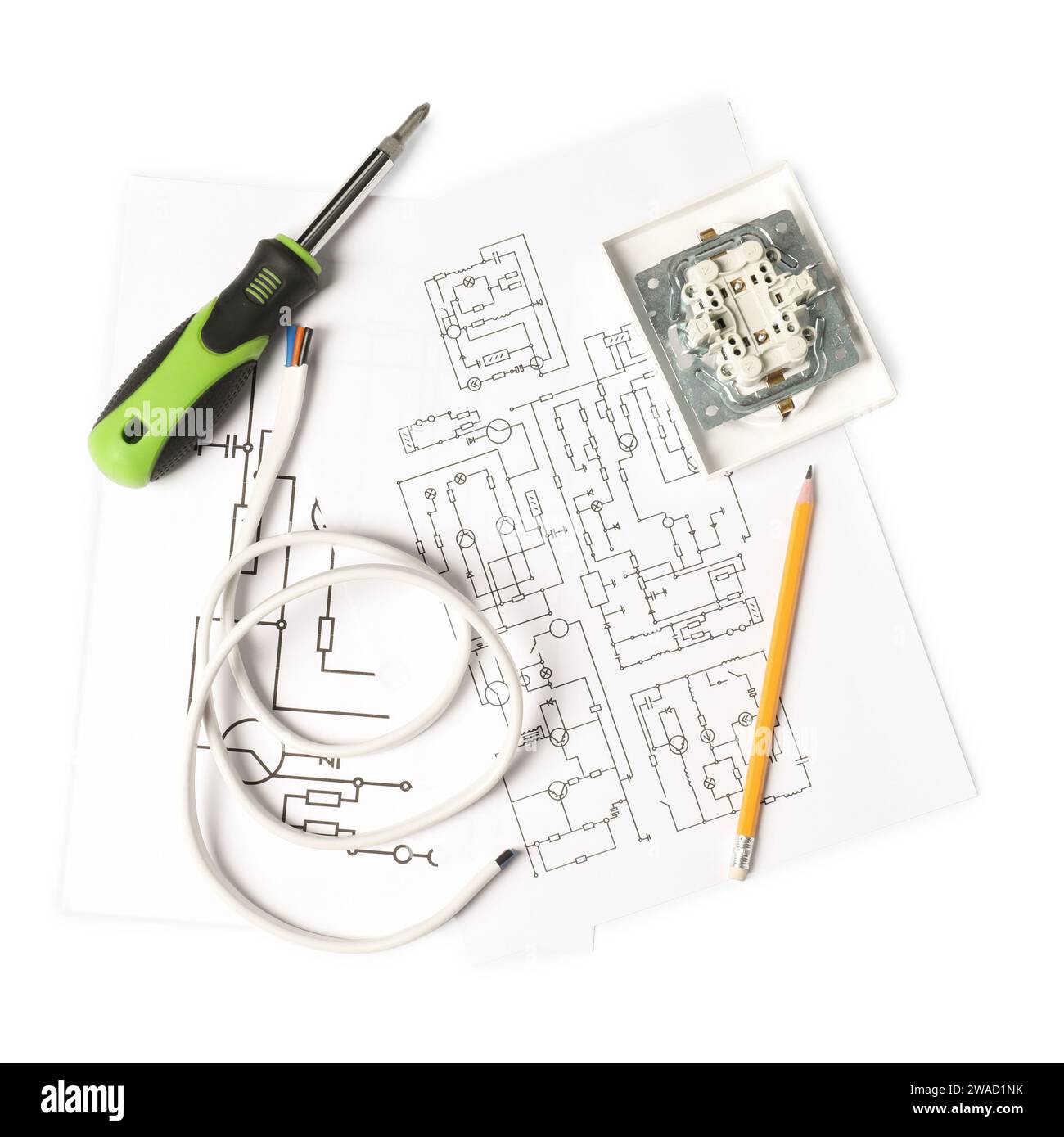 Wiring diagrams, screwdriver and disassembled light switch isolated on