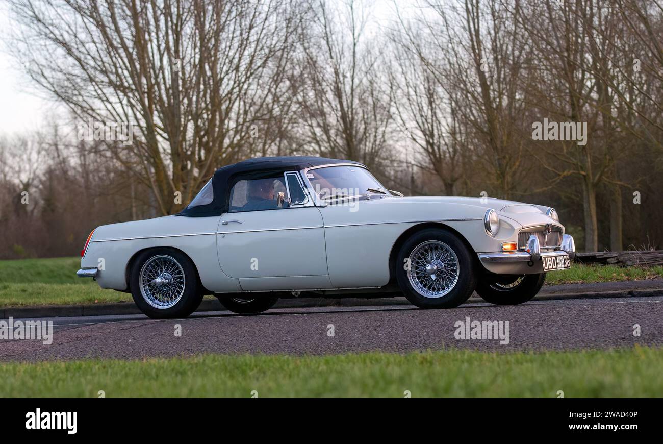 Stony Stratford,UK Jan 1st 2024. 1969 white MG C sports car arriving at