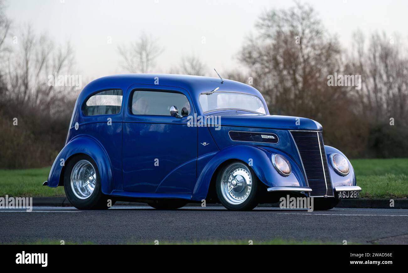 Stony Stratford,UK Jan 1st 2024. 1955 blue Ford Popular car arriving at