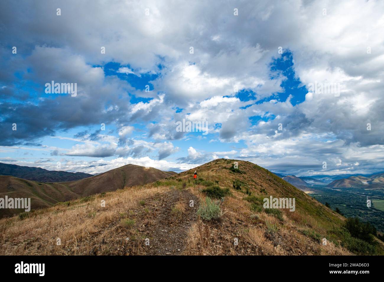 USA, Idaho, Hailey, Senior woman hiking Carbonate Mountain trail Stock ...