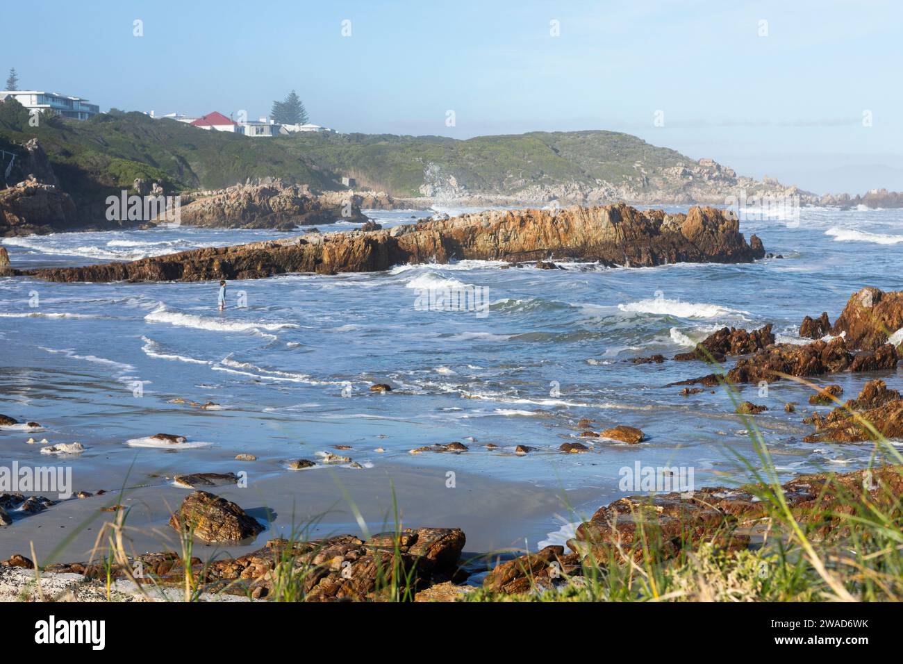 South Africa, Hermanus, Waves washing against rocks on Kammabaai Beach Stock Photo