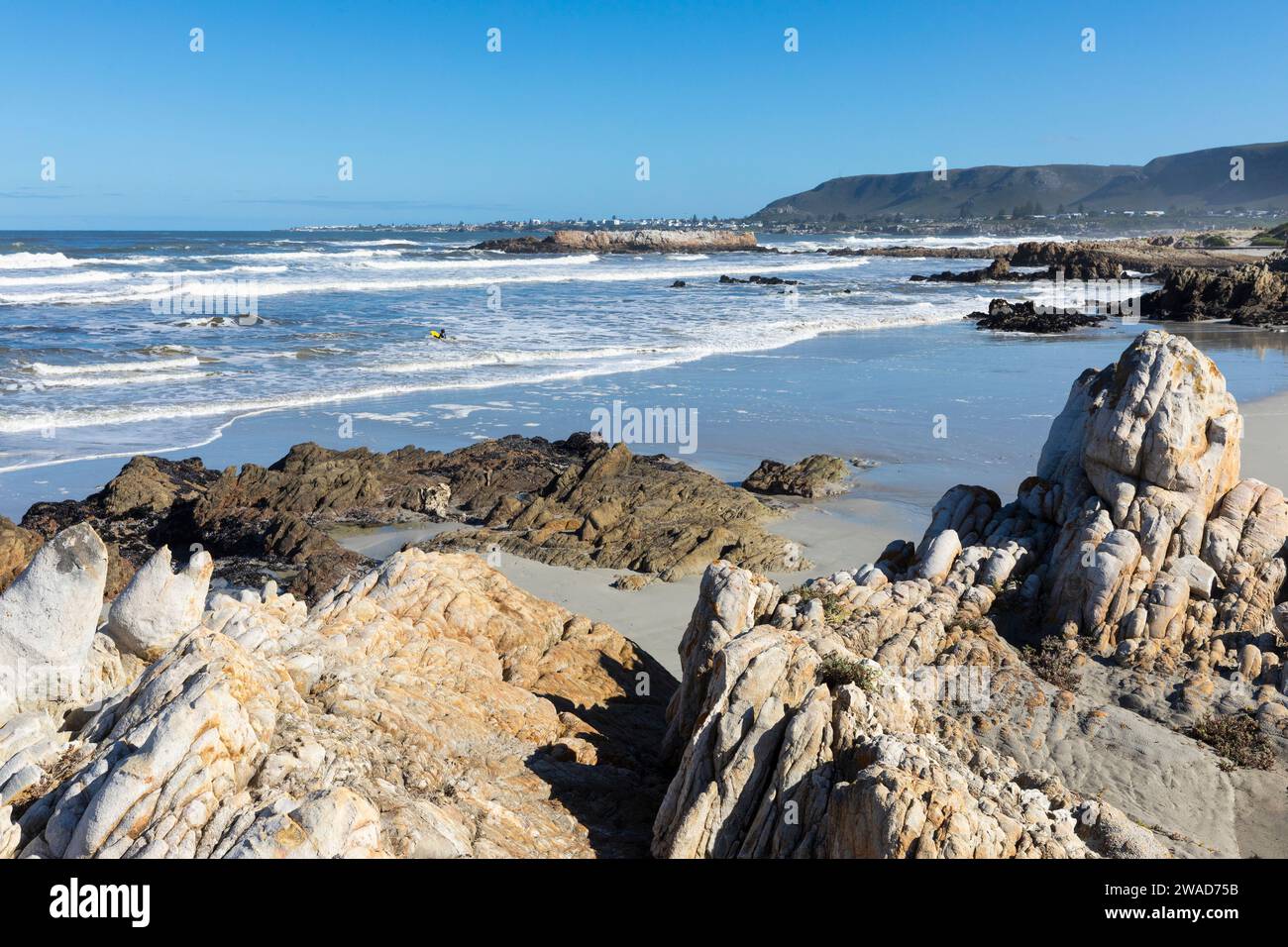 South Africa, Hermanus, Rocky coastline and sea at Voelklip Beach Stock Photo