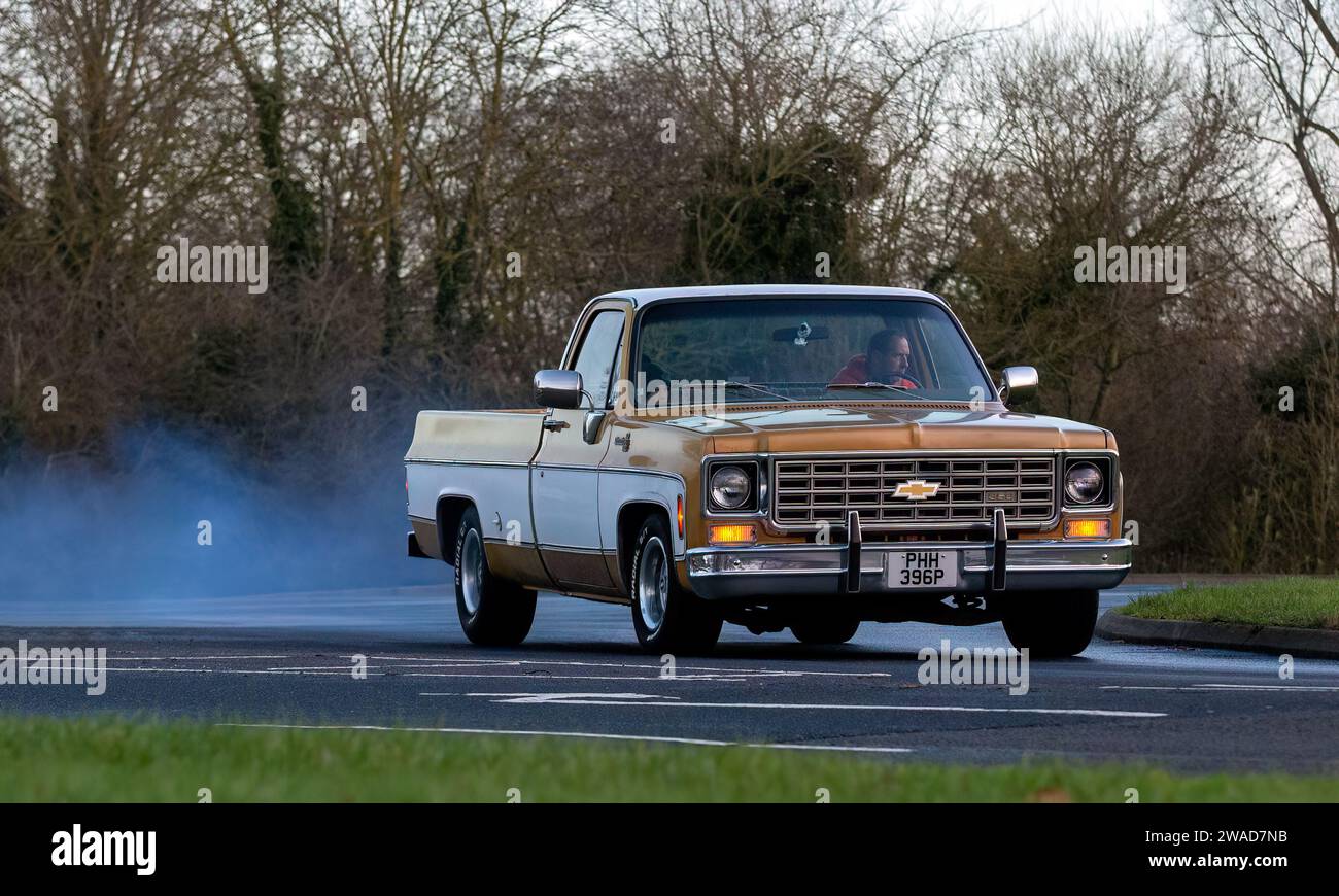 Stony Stratford,UK Jan 1st 2024. 1976 Chevrolet pick up truck arriving at Stony Stratford for the annual New Years Day vintage and classic vehicle fes Stock Photo
