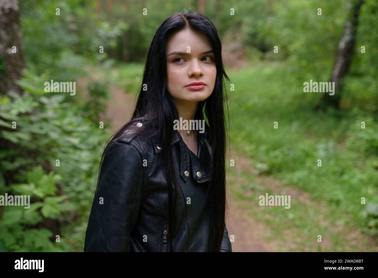 Woman in black leather jacket hi-res stock photography and images - Alamy