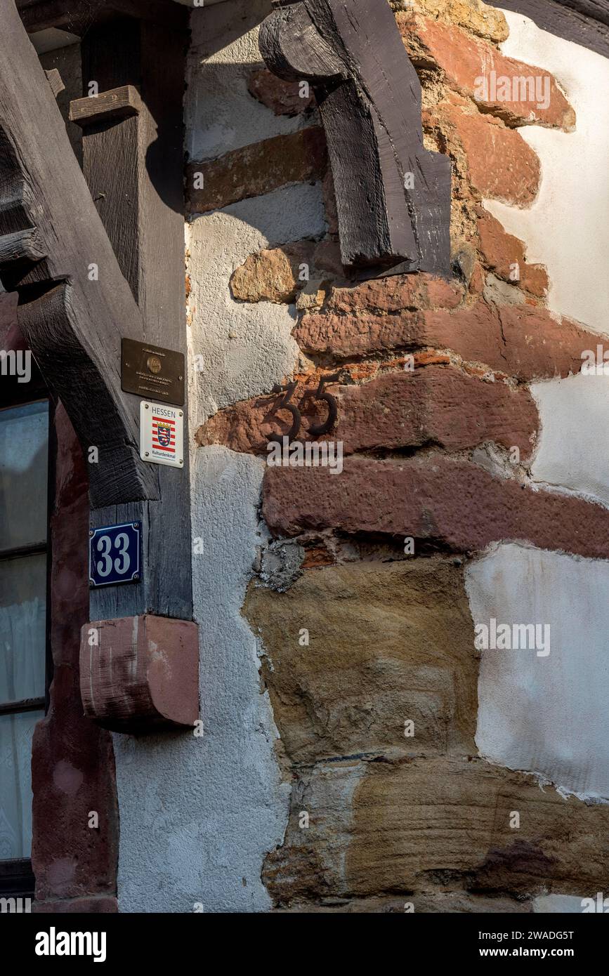 Coloured sandstone under plaster, sandstone, Burgmannenhaus, historic half-timbered house, cultural monument, medieval Friedberg castle, old town Stock Photo