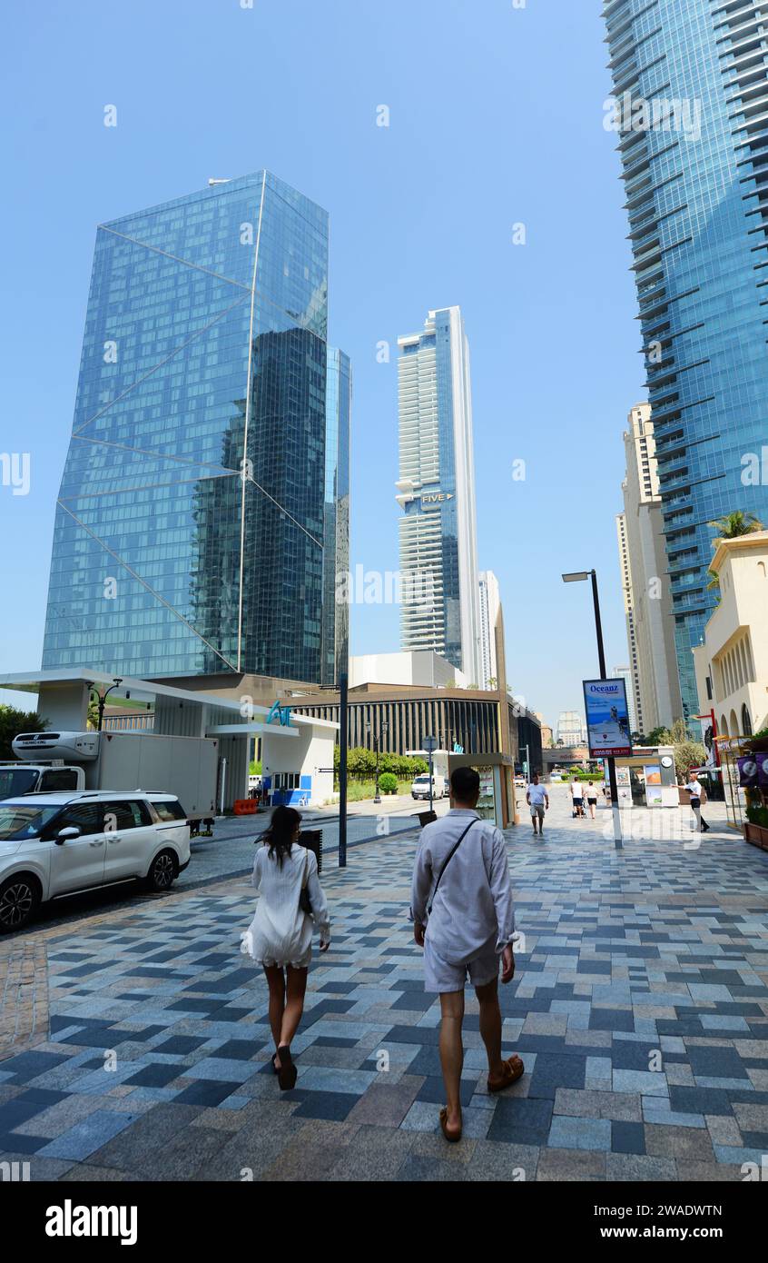 Walking along Al Mamsha Street in the Jumeirah Beach residence by the Marina beach in Dubai, UAE. Stock Photo