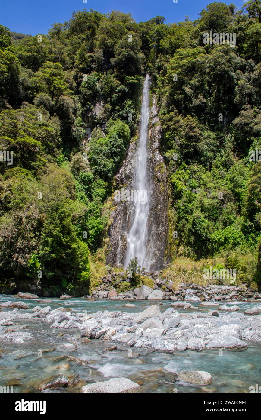 Thunder Creek Falls is a waterfall in Mount Aspiring National Park, Westland District, New Zealand. It is located in the Haast River valley. Stock Photo