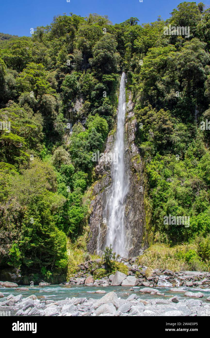 Thunder Creek Falls is a waterfall in Mount Aspiring National Park, Westland District, New Zealand. It is located in the Haast River valley. Stock Photo