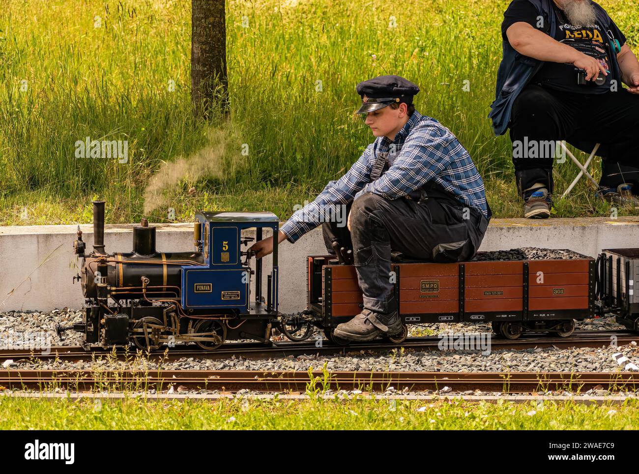 Guy on train hi-res stock photography and images - Alamy