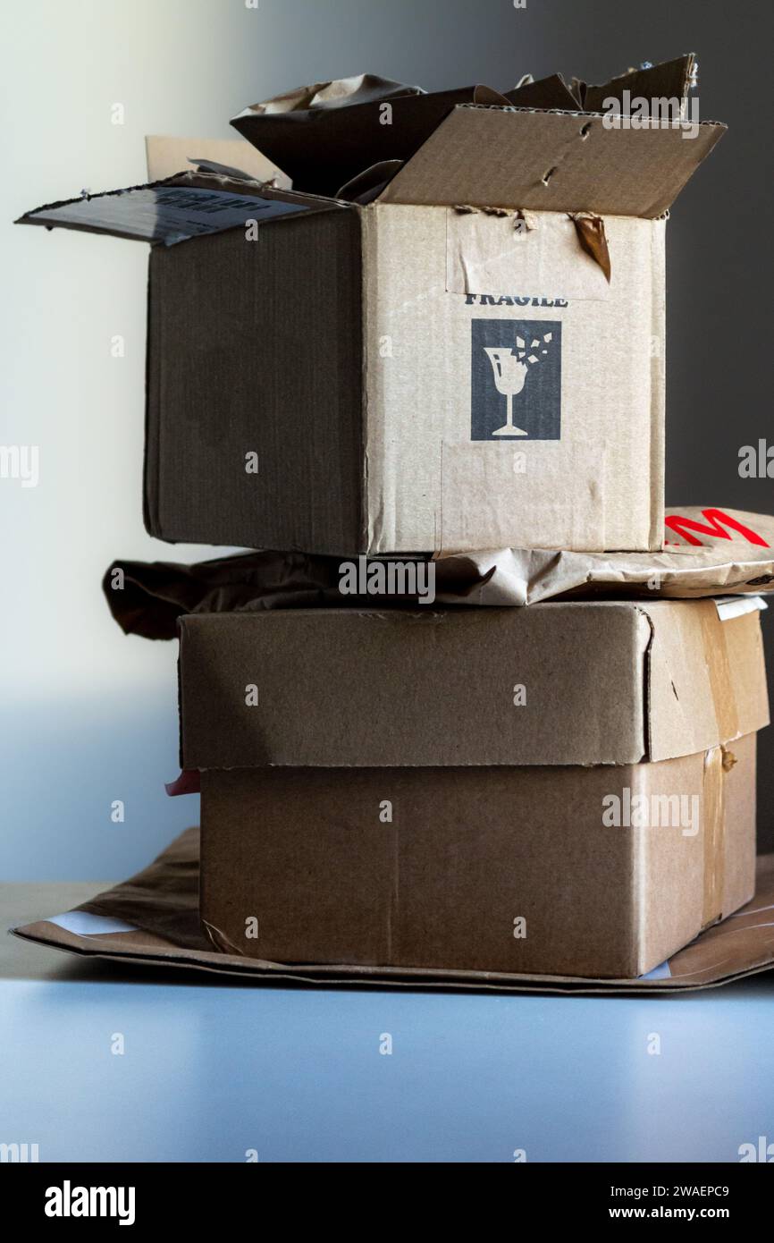 Opened cardboard bags and boxes from delivered parcels Stock Photo Alamy