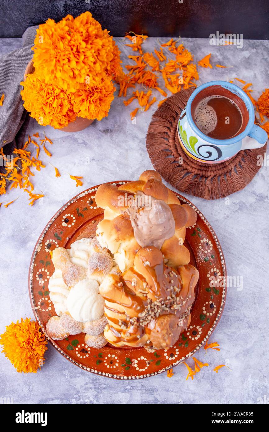 Bread of the dead and hot chocolate, typical Mexican food to celebrate with the family Stock Photo