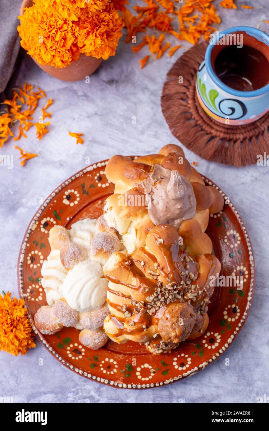 Bread of the dead and hot chocolate, typical Mexican food to celebrate with the family Stock Photo