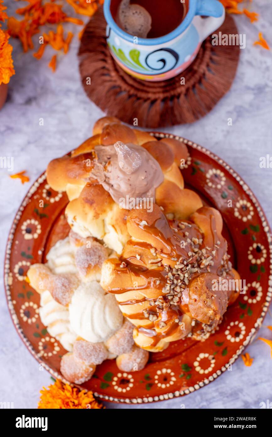Bread of the dead and hot chocolate, typical Mexican food to celebrate with the family Stock Photo