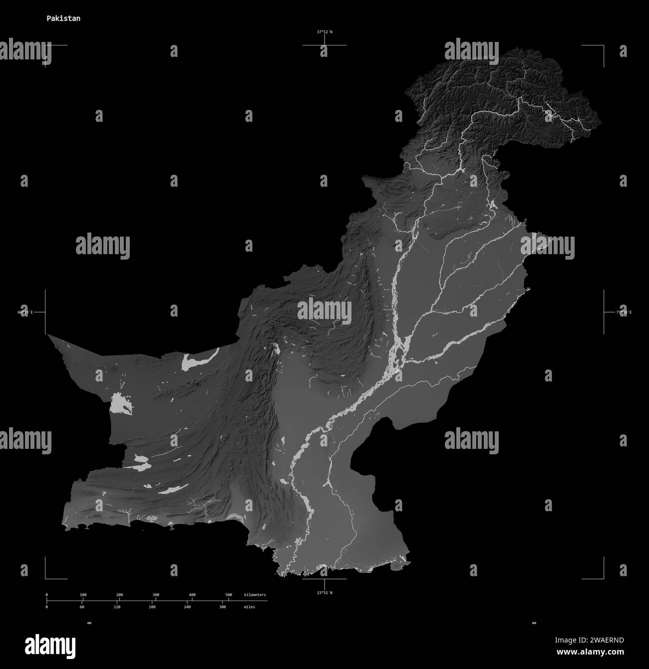 Shape of a Grayscale elevation map with lakes and rivers of the Pakistan, with distance scale and map border coordinates, isolated on black Stock Photo