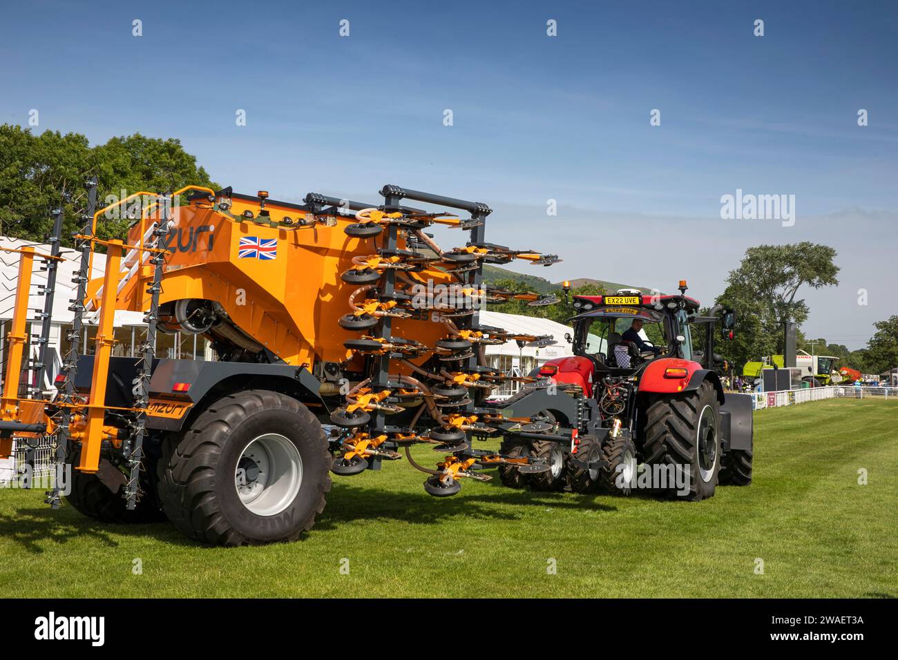 UK, England, Worcestershire, Malvern Wells, Royal 3 Counties Show, Farm Machinery display, tractor with Mzuri iPass Seed Drill for minimum soil distur Stock Photo