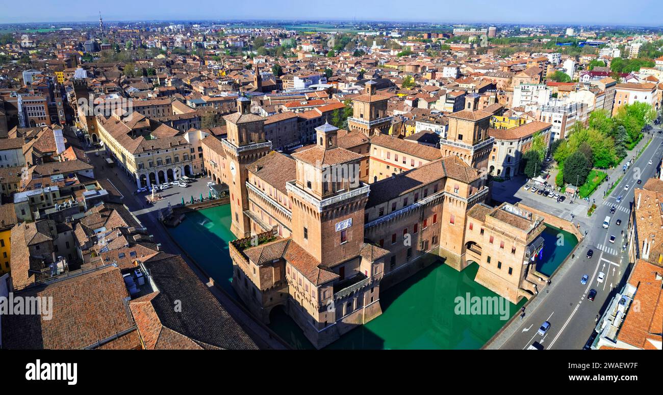 Ferrara - beautiful medieval town in Emilia Romagna Italy. aerial drone view of castle Estense in historic center Stock Photo