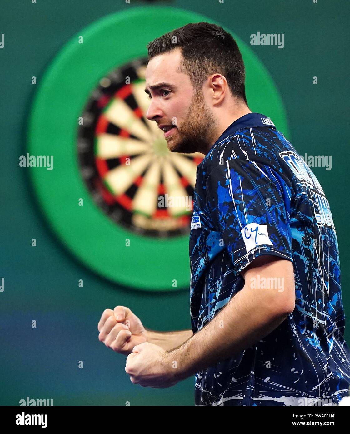 Luke Humphries celebrates after victory over Luke Littler (not pictured