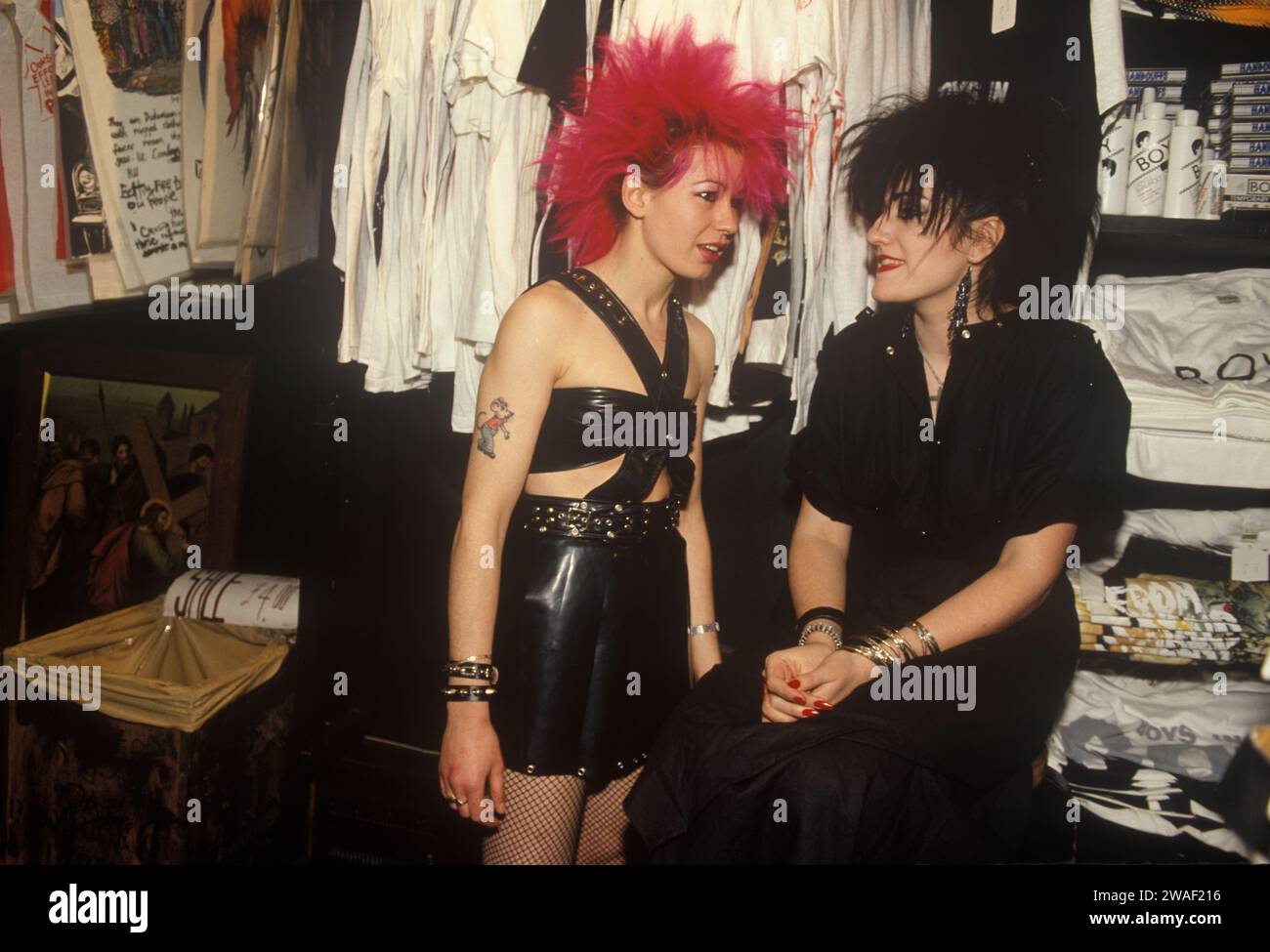 Punk teenage girls shop assistants in Boy a punk clothes shop boutique at 153  Kings Road, Chelsea 1980s UK. Chelsea, London, England 1983 HOMER SYKES Stock Photo