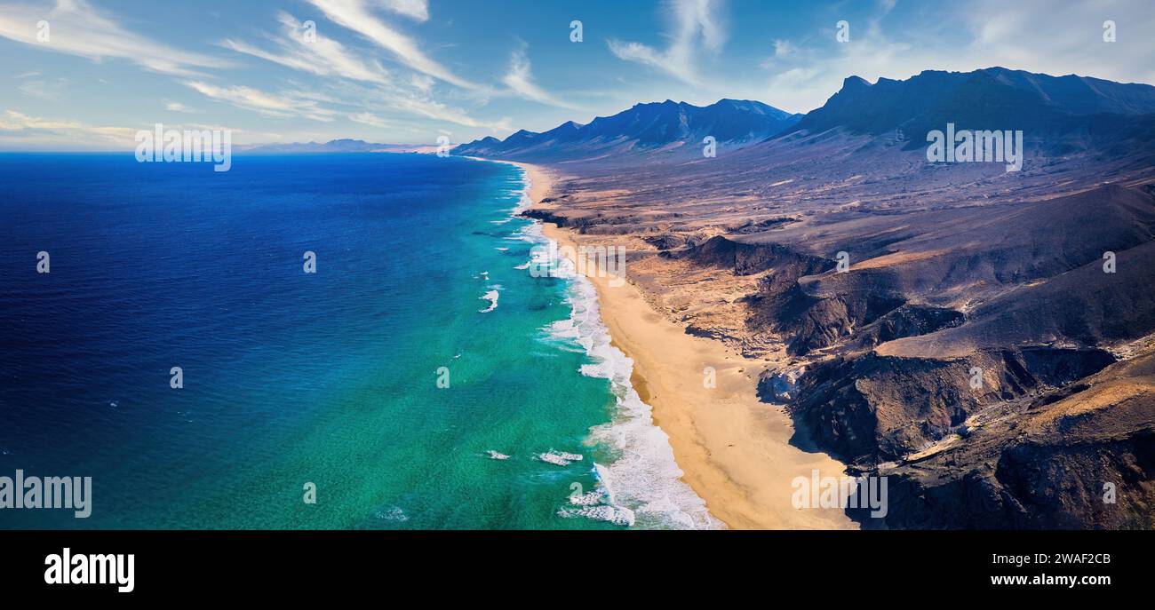 Aerial, panoramic view of the beautiful, unspoiled  Cofete beach on the volcanic island of Fuerteventura, Canary Islands, Spain. Stock Photo