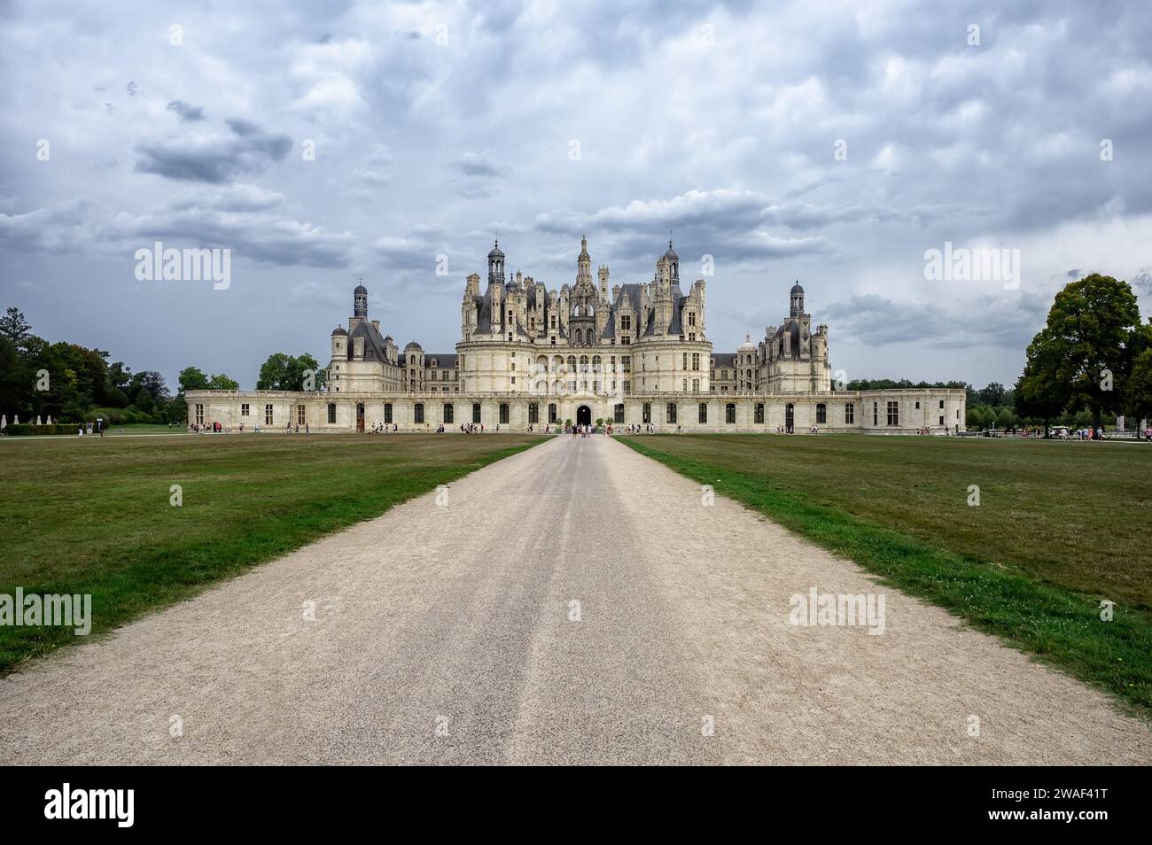 The Château de Chambord on a cloudy day. A castle with more than 400 rooms to visit with the family, in the Loire Valley, France. Stock Photo