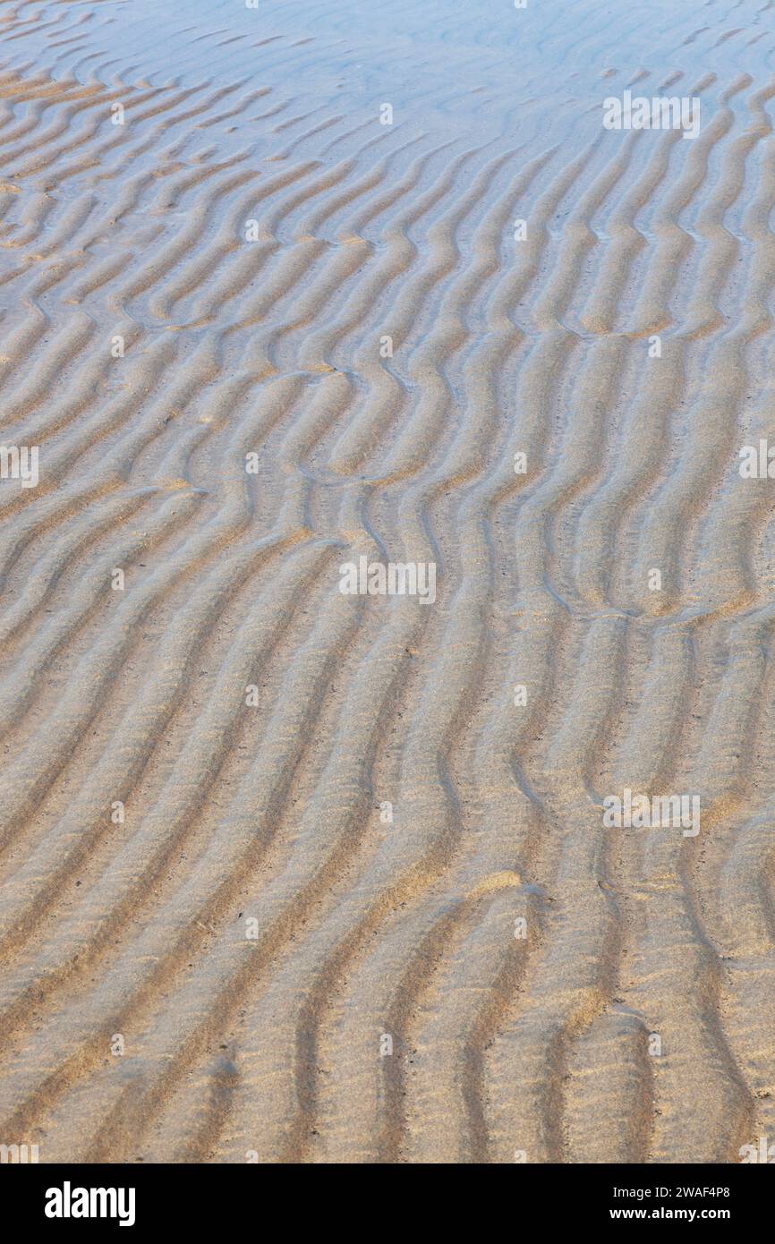 Natural sand patterns on a beach in Cornwall, England, UK Stock Photo