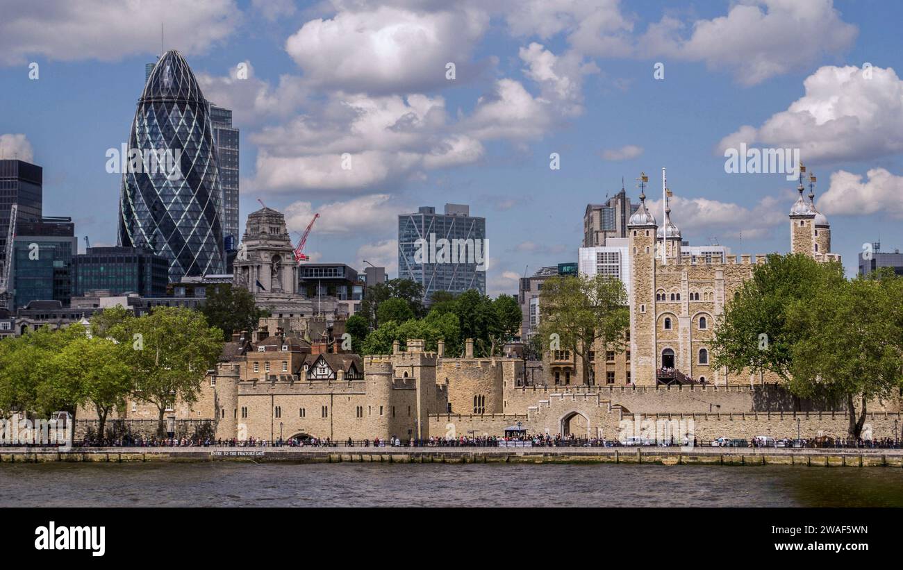 London, UK - July 19th 2011: The Tower of London viewed from the River Thames with the Gherkin and Port of London Authority Building. Stock Photo