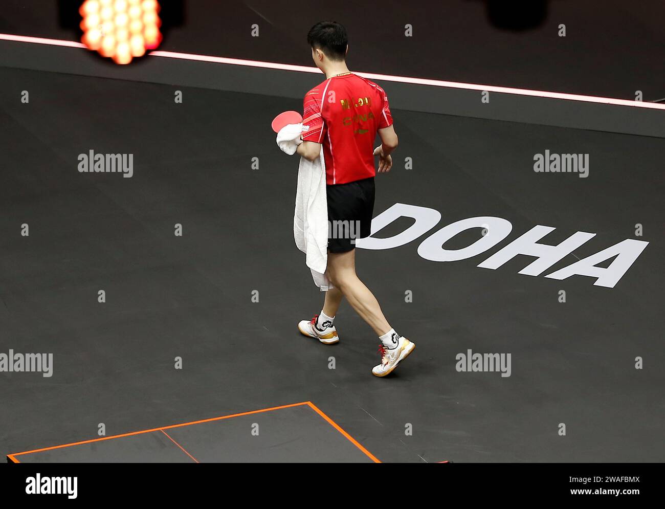 Doha, Qatar. 4th Jan, 2024. Ma Long leaves after the men's singles quarterfinal between Ma Long