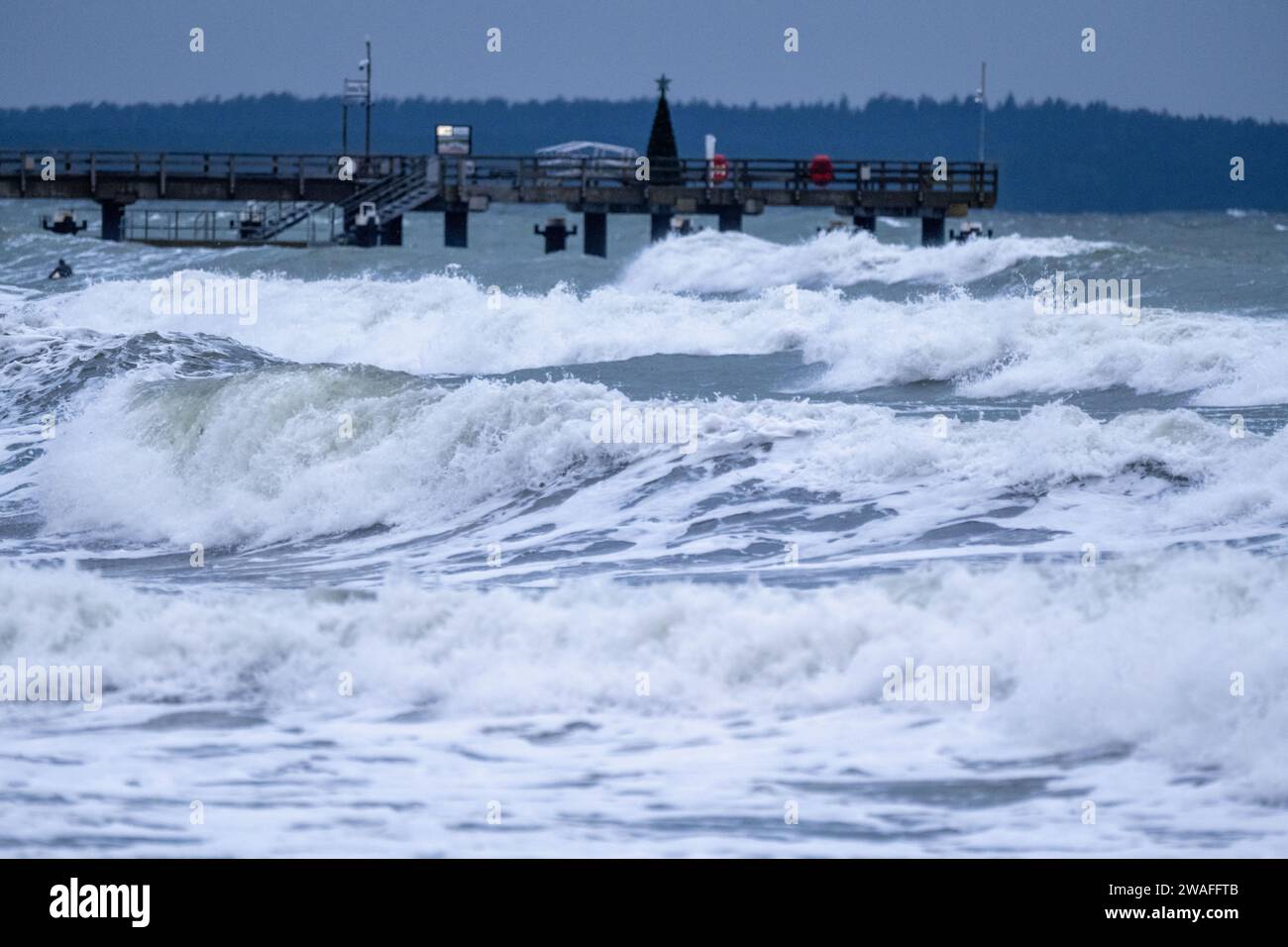 Binz, Germany. 04th Jan, 2024. Waves hit the Baltic Sea beach. The ...
