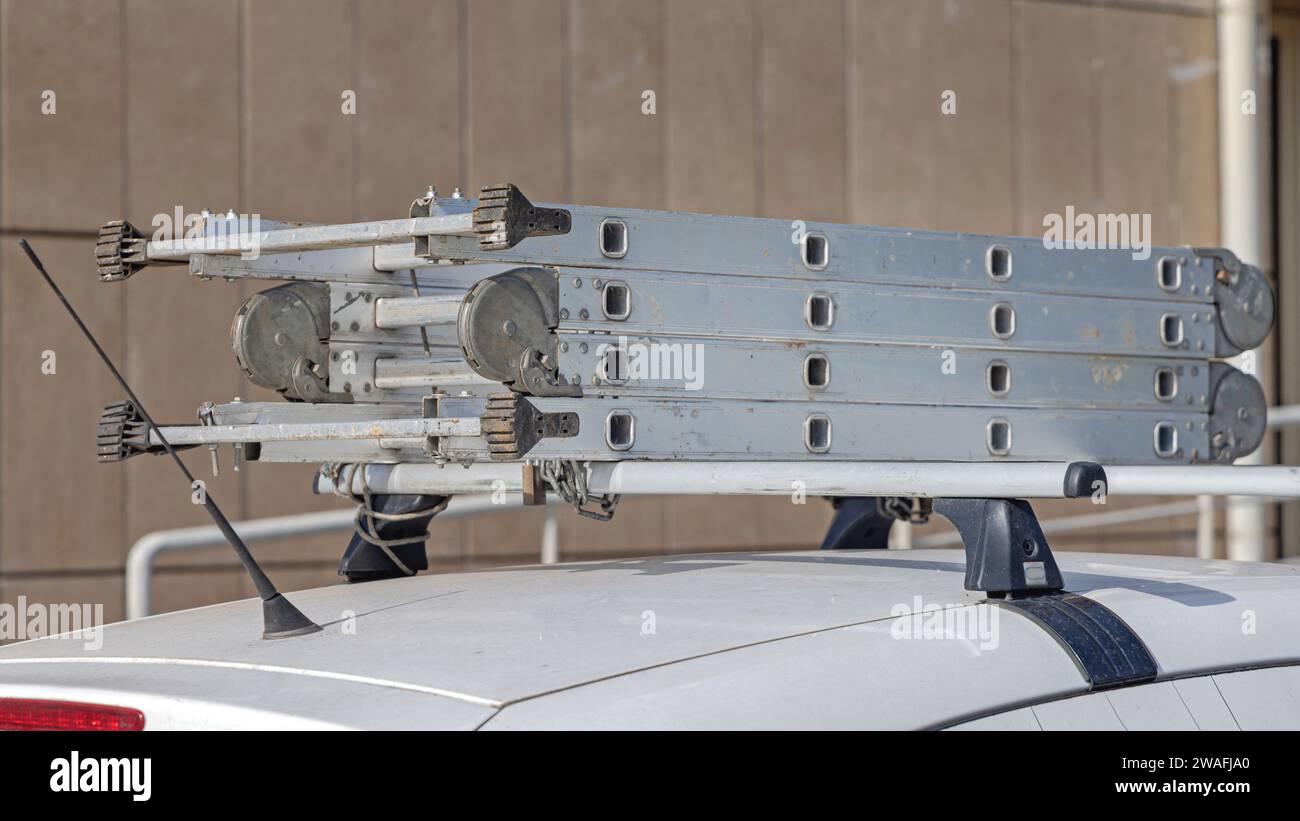 Ladder Car Foldable Aluminium Ladder at Top of Car Roof Rack Transport Stock Photo ...