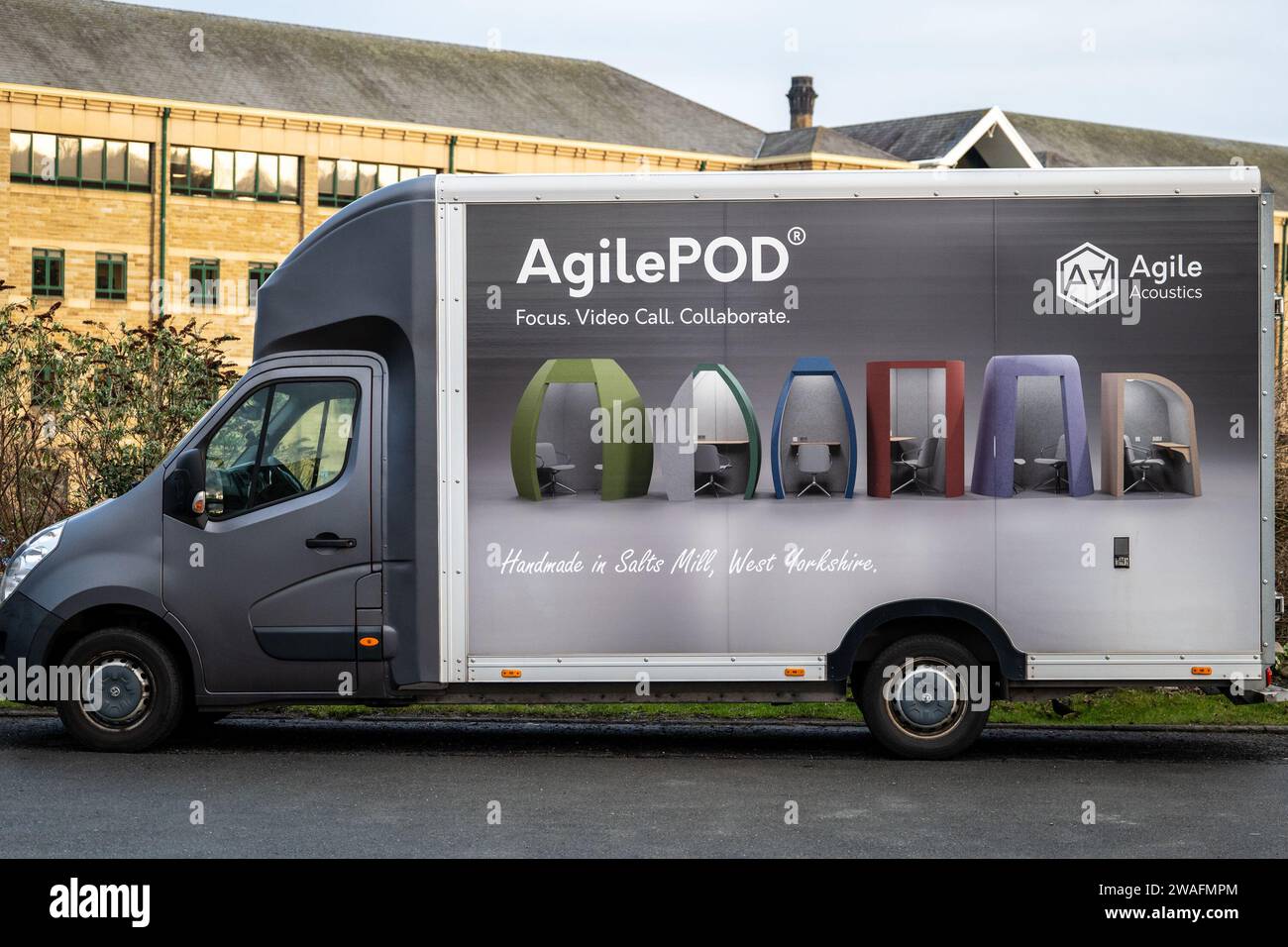AgilePOD acoustic office space pods advertised on AgileAcoustics company van in Salts Mill Stock Photo