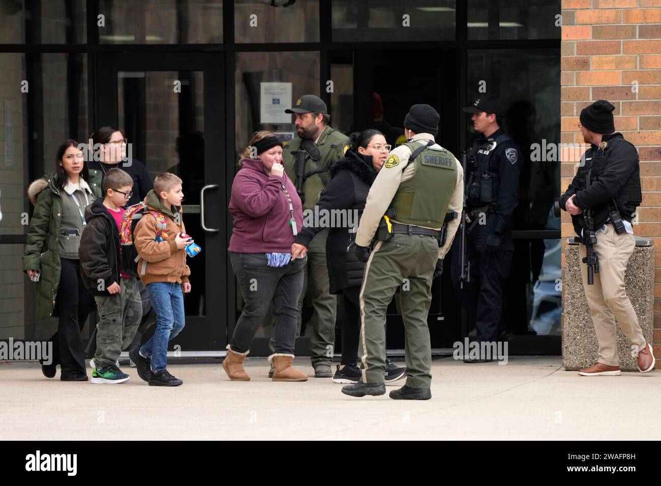 People leave the McCreary Community Building after being reunited