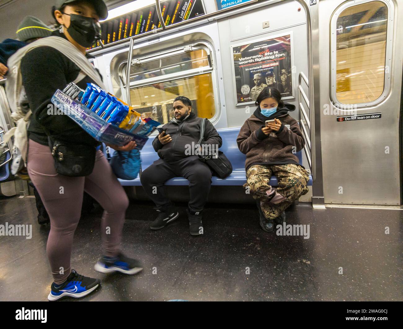 Peddler selling candy in the New York subway on Saturday, December 30, 2023. (© Richard B. Levine) Stock Photo