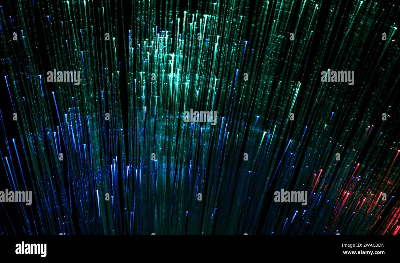 Optical fiber network cable on black background Stock Photo
