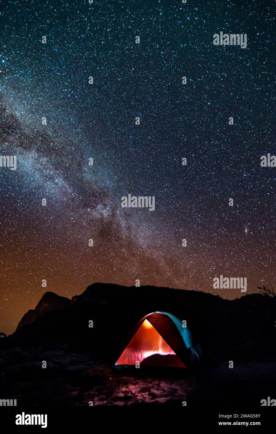 Tourist camping tent under starry night sky with Milky Way Stock Photo ...