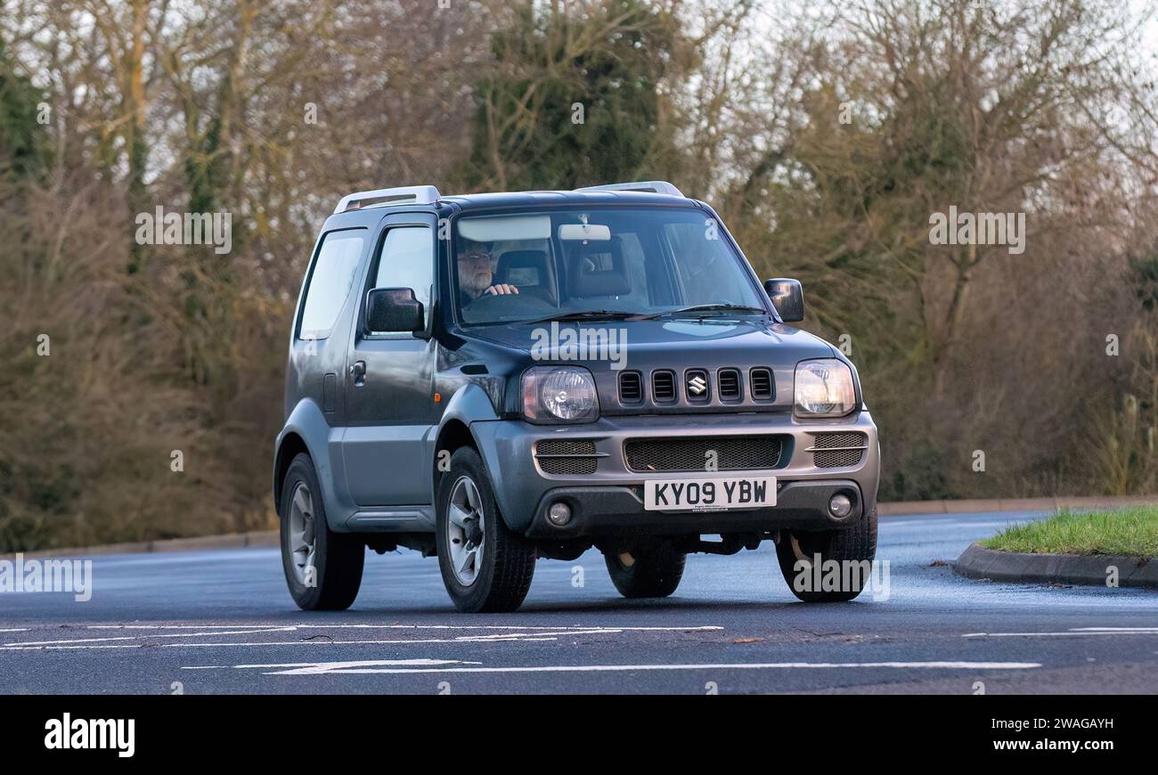 Stony Stratford,UK Jan 1st 2024.2009 Suzuki Jimny car arriving at Stony Stratford for the annual New Years Day vintage and classic vehicle festival. Stock Photo