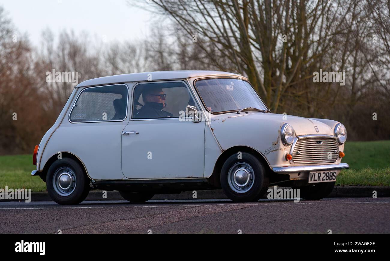 Stony Stratford,UK Jan 1st 2024. 1977 white British Leyland Mini 1000 car arriving at Stony Stratford for the annual New Years Day vintage and classic Stock Photo