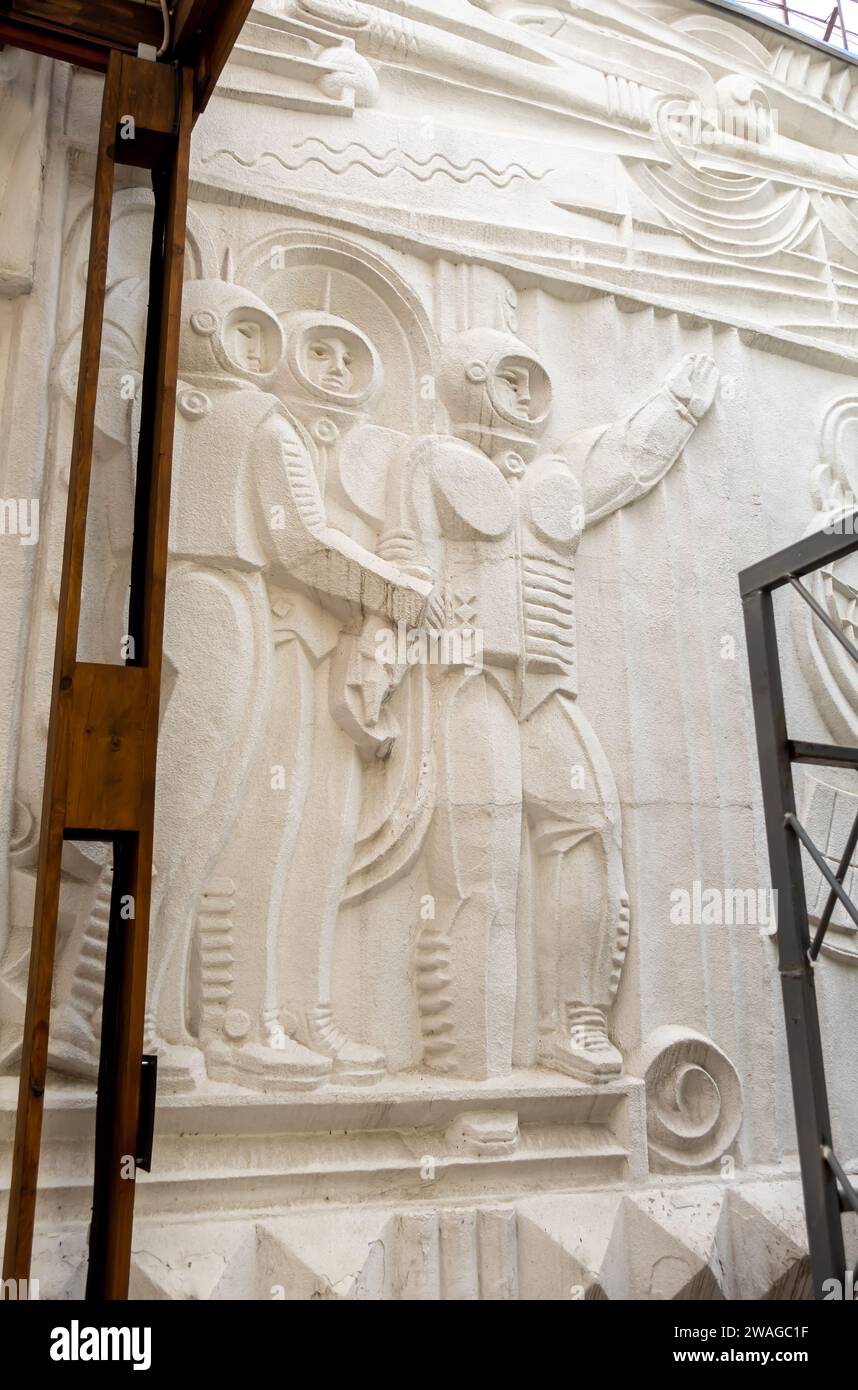 A bas-relief on Arman historic theatre decpicting cosmonauts, 1968. Author: Konstantinov Viktor Stock Photo